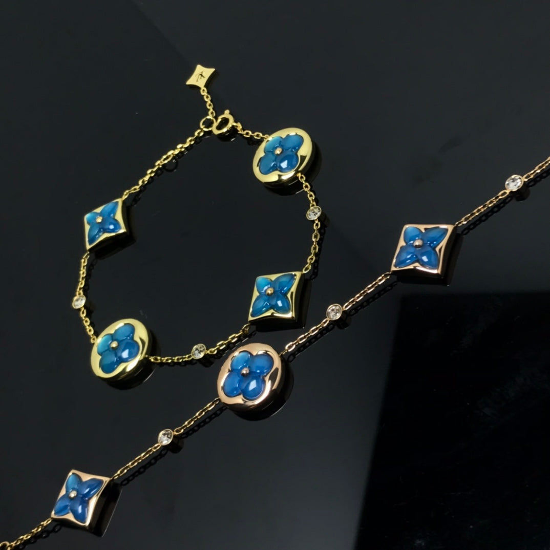 ¡®AuraJewelry¡¯STAR AND SUN 4 MOTIF BLUE BRACELET