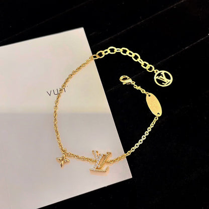 ¡®AuraJewelry¡¯LOGO STAR MOTIF GOLD BRACELET