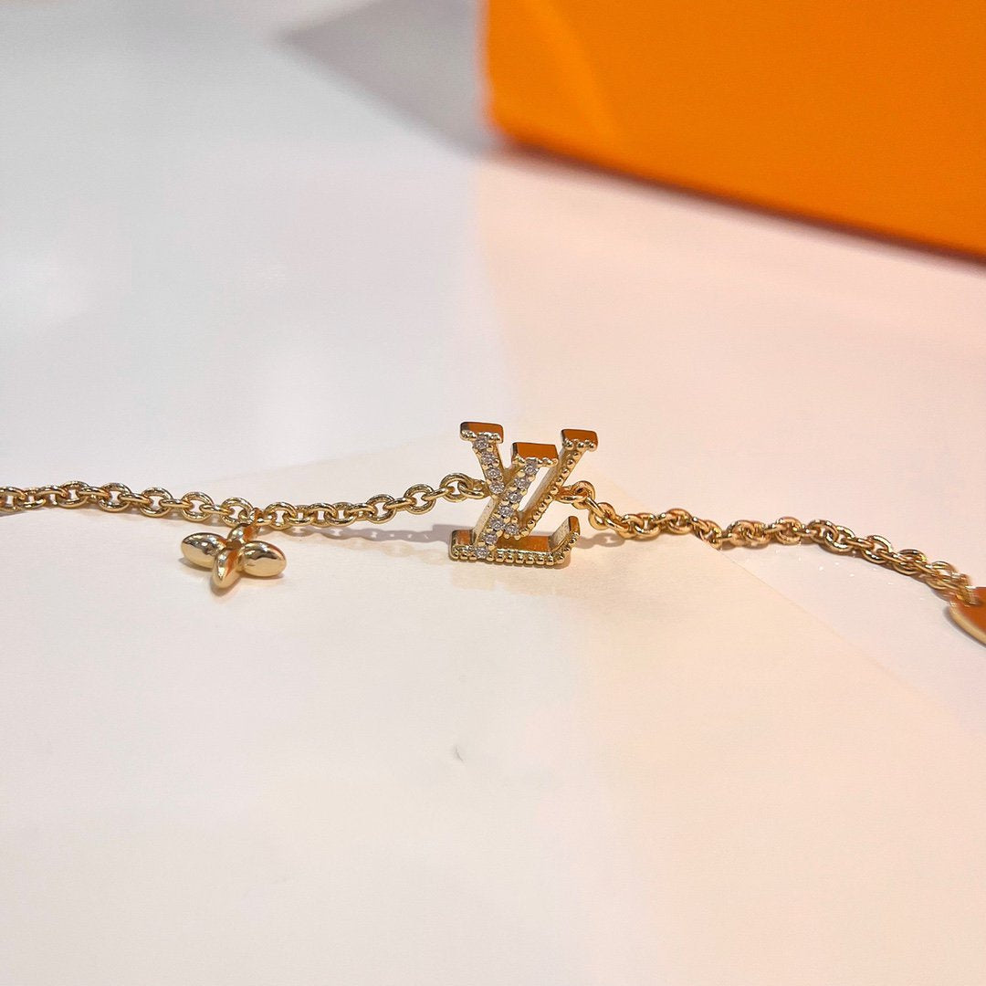 ¡®AuraJewelry¡¯LOGO STAR MOTIF GOLD BRACELET