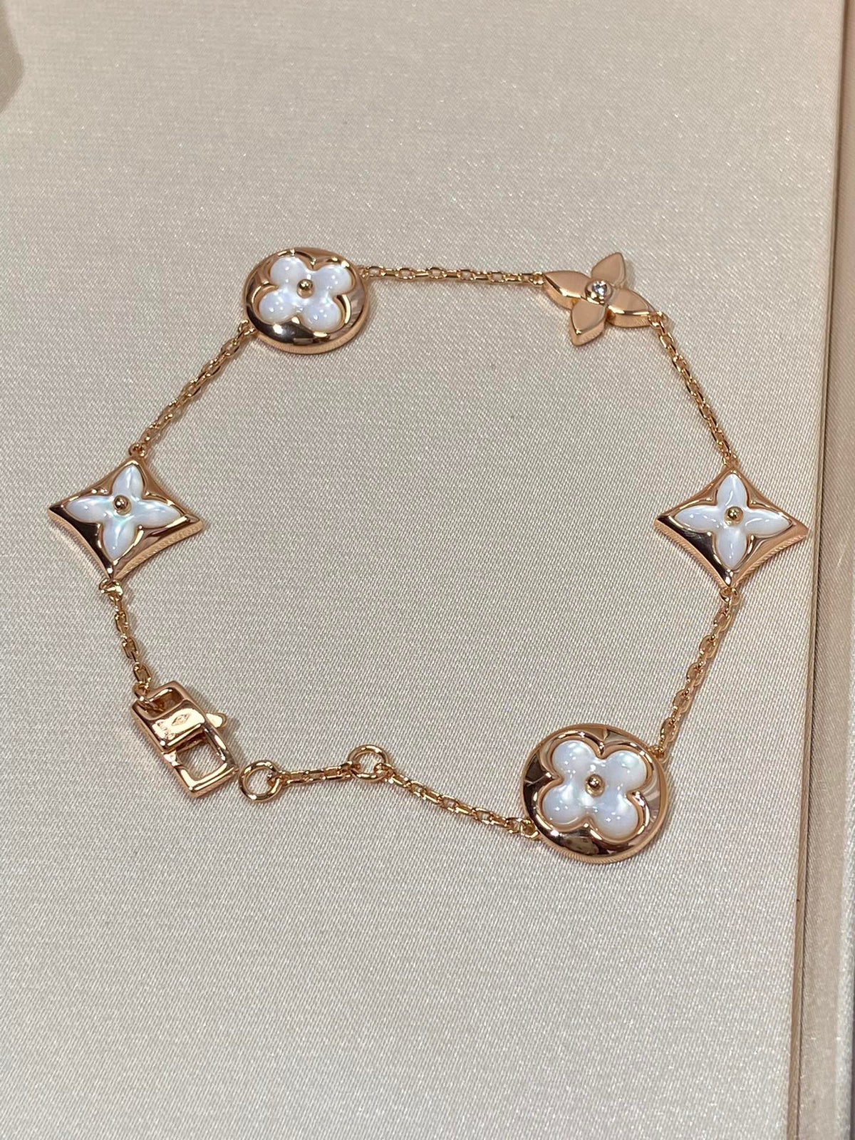 ¡®AuraJewelry¡¯STAR AND SUN 5 MOTIF MOP PINK GOLD BRACELET