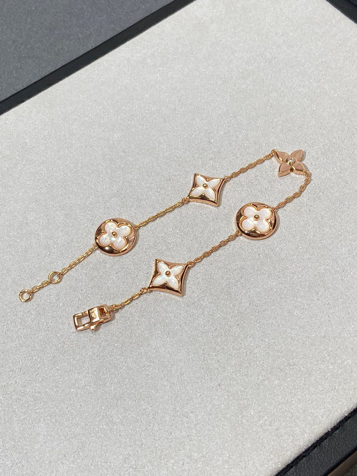 ¡®AuraJewelry¡¯STAR AND SUN 5 MOTIF MOP PINK GOLD BRACELET