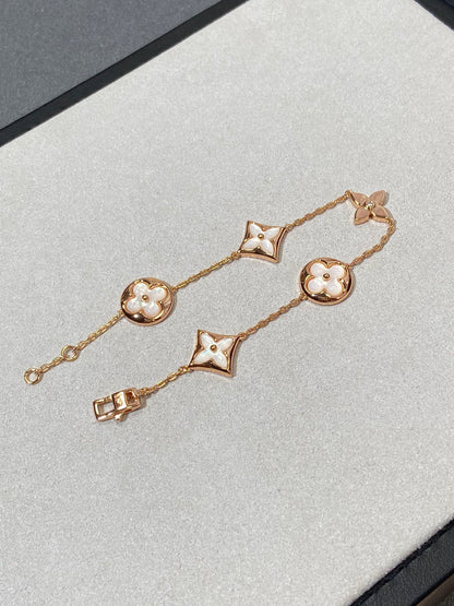 ¡®AuraJewelry¡¯STAR AND SUN 5 MOTIF MOP PINK GOLD BRACELET