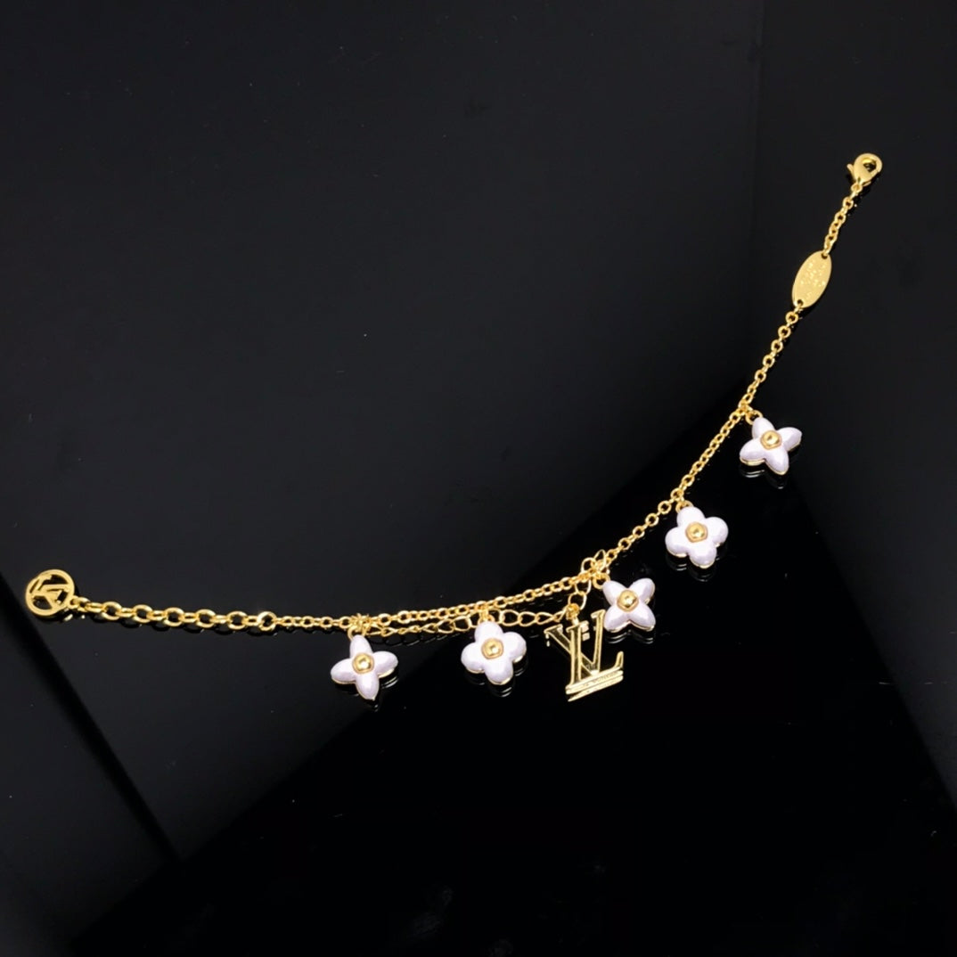 ¡®AuraJewelry¡¯LOGO 6 MOTIF STAR AND SUN GOLD BRACELET