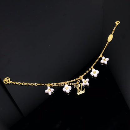 ¡®AuraJewelry¡¯LOGO 6 MOTIF STAR AND SUN GOLD BRACELET