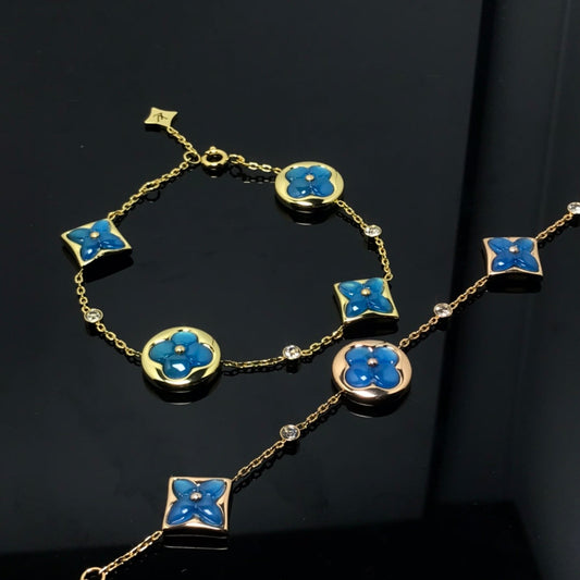 ¡®AuraJewelry¡¯STAR AND SUN 4 MOTIF BLUE BRACELET